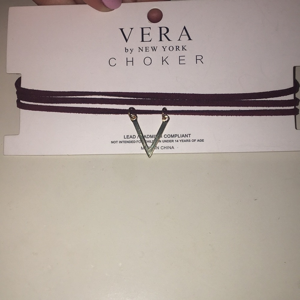 burgundy choke with gold triangle hanging
